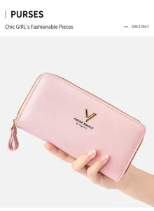 Pink long wallet for women, stylish zipper purse with card slots and wrist strap design.