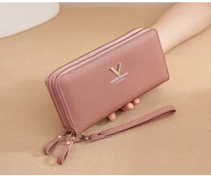 Pink double zipper long wallet detail shot, featuring metal V logo and convenient wrist strap.