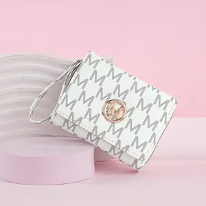 Portefeuille court à trois volets pour femme avec motif monogramme et logo M, porte-cartes.