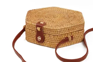 Woven rattan crossbody bag for women, handmade straw shoulder bag with brown leather strap.