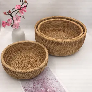 Vietnamese ronde rotan opbergmand fruitschaal voor woonkamer en huishoudelijke organisatie.