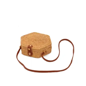 Woven rattan crossbody bag for women, hexagonal straw shoulder bag with leather strap.