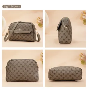 Detailed view of the light brown monogram crossbody bag showcasing its texture and hardware.