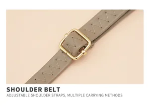 Detailed view of women bag adjustable shoulder strap with gold buckle and stylish stitching.
