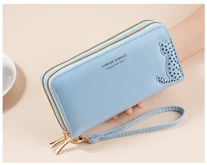 Detailed view of light blue long PU leather wallet with double zippers and cute cat pattern.