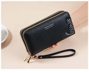 Women long PU leather wallet double zipper coin purse with wrist strap and cute cat decor.