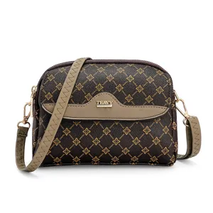 Stylish women's monogram crossbody bag with flap and gold hardware for daily casual wear.