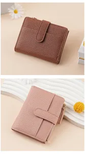Women bifold short wallet with zipper coin pocket and multiple card slots in stylish pebble leather.