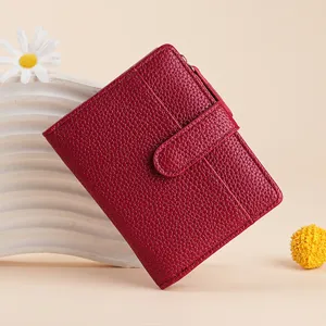 Red leather bifold short wallet for women, compact card holder with zipper coin pocket stylish.