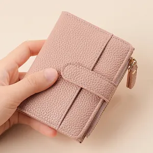 Pink PU leather short wallet detail, featuring multi-card slots and secure zipper coin pocket.