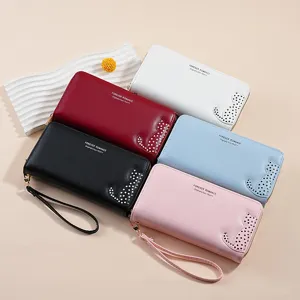 Long PU leather women wallet with cute cat cutout design, multiple colors and wrist strap.
