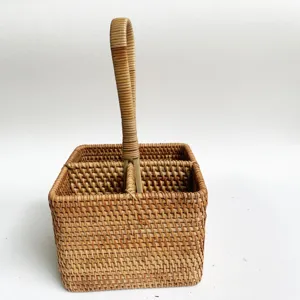 Detailed view of handwoven rattan desktop organizer caddy with convenient compartments.