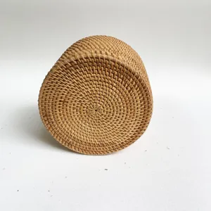 Close-up detail of natural woven rattan basket bottom, showing exquisite handcraft texture.
