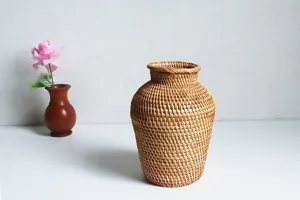 Detailed view of the natural rattan woven vase, perfect for rustic home decor and styling.