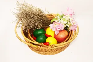 Round woven rattan fruit basket set, pastoral storage basket for home kitchen organization.