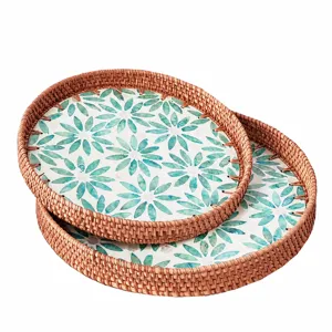 Round rattan serving tray with shell inlay, perfect for home decor, coffee table and fruit storage.