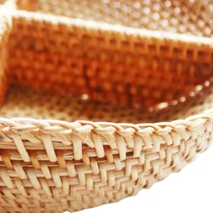 Handcrafted woven rattan fruit tray, compartment snack storage basket for living room decor.