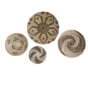 Set of 4 natural seagrass woven decorative plates for wall hanging home decor.