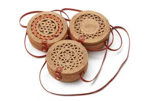 Handmade round rattan straw crossbody bag, retro woven shoulder bag for women beach travel.