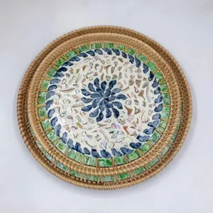 Round autumn rattan woven tray with colorful shell mosaic design for home living room decor.