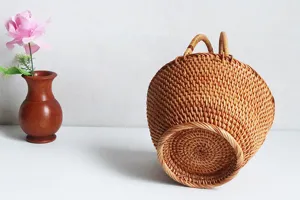 Handcrafted rattan woven storage basket detail shot showing exquisite texture and natural material.
