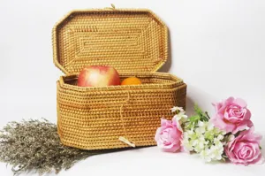 Detail view of the handmade polygonal woven rattan storage box with lid, natural texture showcase.