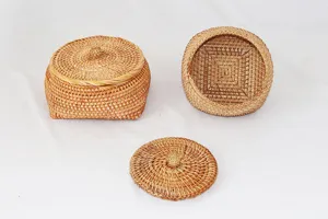 Detailed view of handmade rattan storage box featuring natural woven texture and lid design.