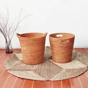 Natural woven rattan storage basket set, perfect for bedroom laundry and household organization.
