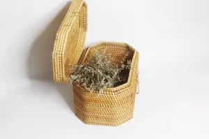 Handmade woven rattan polygon storage basket with lid, perfect for organizing cosmetics.