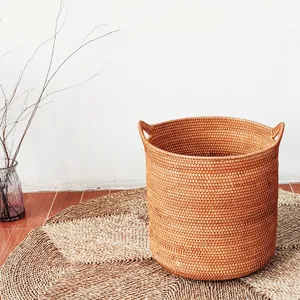Handmade woven storage basket for bedroom laundry organizer and home decor details.