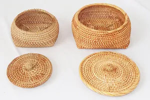 Woven rattan storage box set with lids, Japanese style organizer for living room snacks.