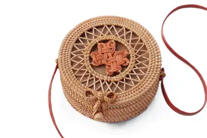Round Bali rattan shoulder bag with bow detail, perfect for beach vacation and daily use 20x8cm