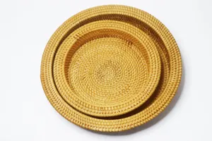 Handmade rattan fruit basket and storage tray set, natural woven design for home use.