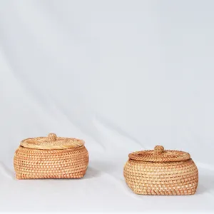 Japanese style hand-woven rattan storage box with lid, perfect for living room organizing.