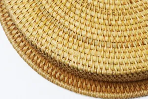 Handcrafted round rattan woven fruit tray for home organization and stylish living room storage.