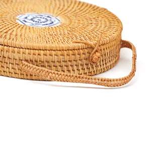 Ronde rotan geweven schoudertas voor dames, natuurlijke stro handtas voor reizen en vakantie.