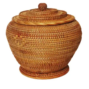 Pot de stockage de thé en rotin fait main, panier tissé traditionnel pour galettes de thé.