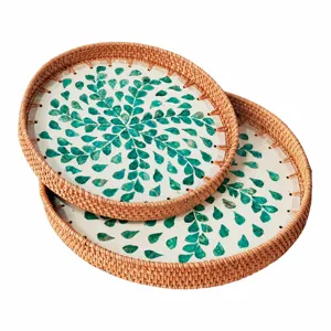 Nordic style round rattan tray with green shell mosaic design for home tea and fruit display.