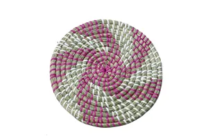 Round woven straw hot pot mat, green white and pink spiral pattern, kitchen insulation pad.