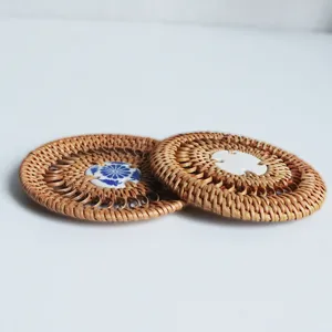 Handmade rattan woven coaster heat resistant tea cup mat set for home kitchen table decor.