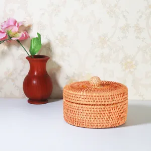 Vietnamese woven rattan storage box with lid, perfect for desktop sundries and nuts organization.