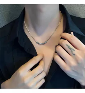 Detailed view of men's titanium steel bamboo joint necklace, trendy silver clavicle chain.