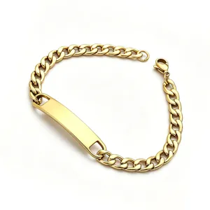 Gold stainless steel curb chain bracelet ID plate detail view, hip hop jewelry style.