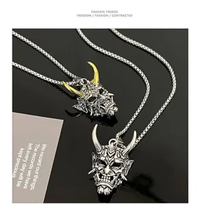 Stainless steel Japanese Hannya mask pendant necklace with golden horns for hip hop style.