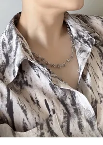 Titanium steel thorn chain necklace for men, minimalist streetwear hip hop fashion jewelry detail.