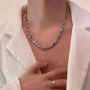 Trendy irregular gravel necklace for men and women, stylish metallic hip-hop jewelry style.