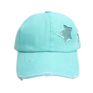 Gewassen turquoise denim honkbalpet met sprankelende glitter ster patch voor dames casual stijl.