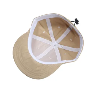 Retro korte rand baseballpet binnenzicht, klassiek kakaki katoen met witte binnenband.