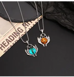 Retro titanium steel devil eye pendant necklace set, detailed close-up of gothic demon design.