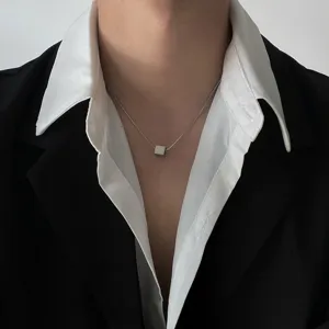 Minimalist titanium steel square pendant necklace detail shot, elegant clavicle chain.